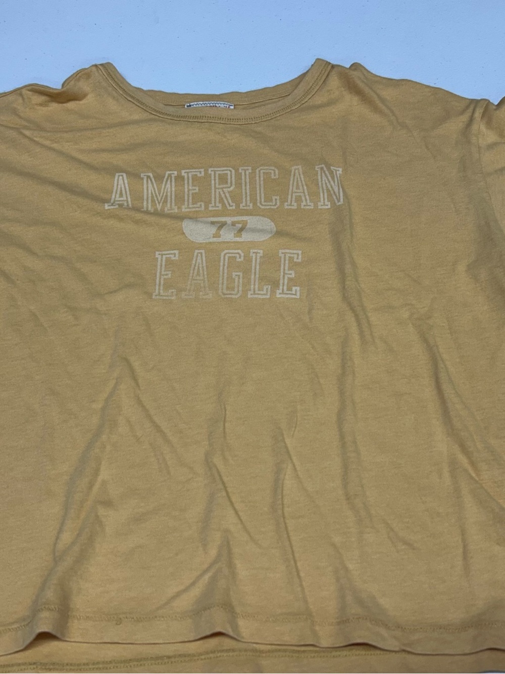 American Eagle Outfitters Men's Pale Yellow Crewneck Graphic Tee